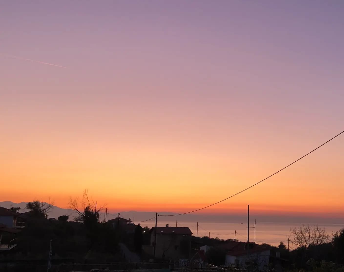 Balcon privat cu vedere la mare și apus