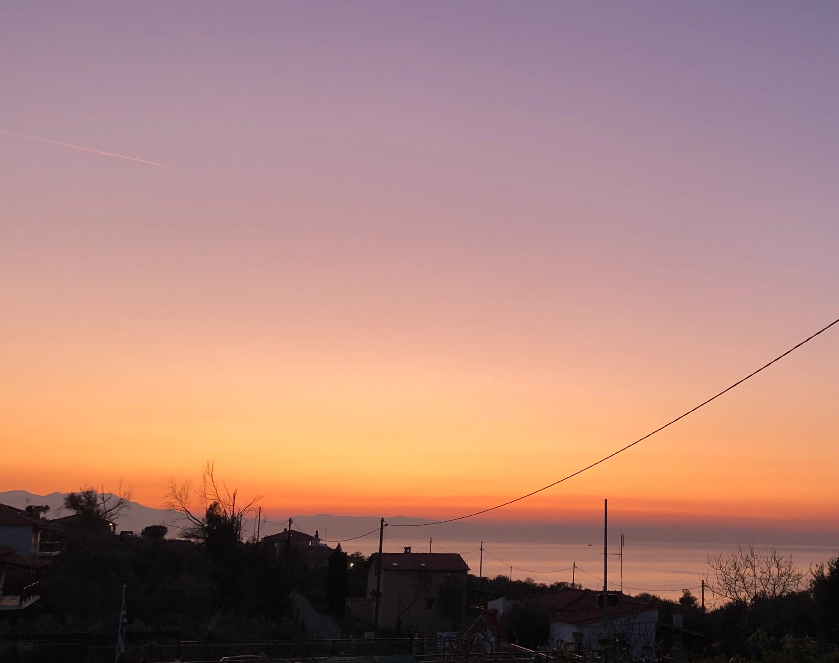 Balcon privat cu vedere la mare și apus